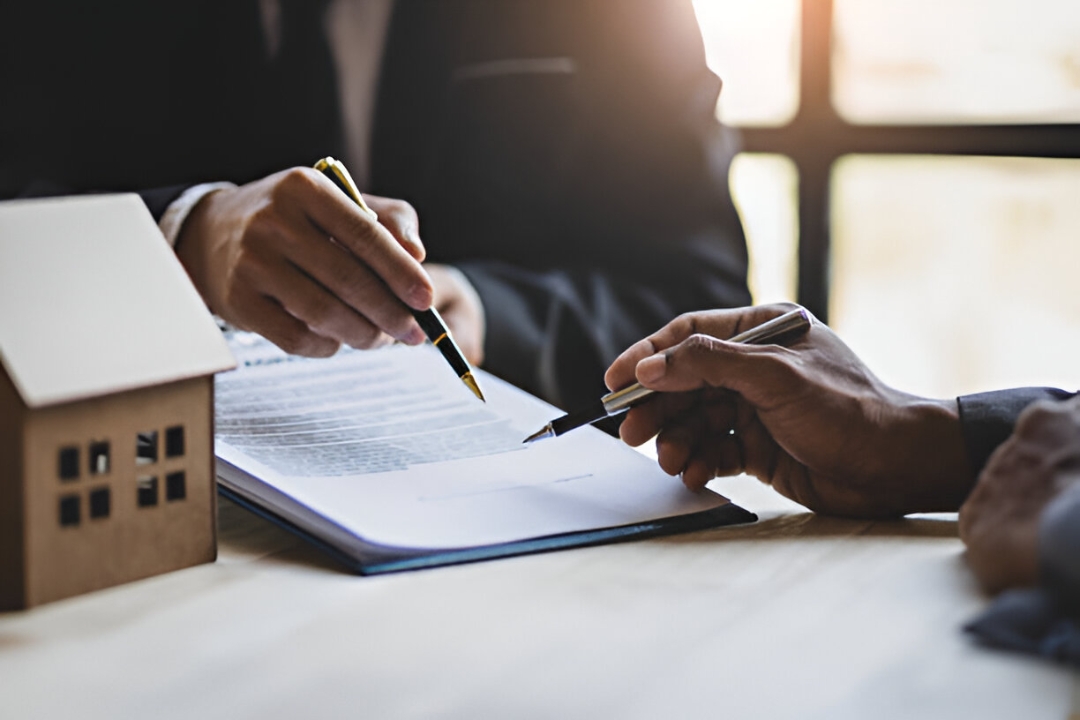 Two hands over a contract with a house model, emphasizing that KBR investing helps Buy a home with no credit score. Two hands over a contract with a house model, emphasizing that KBR investing helps Buy a home with no credit score.