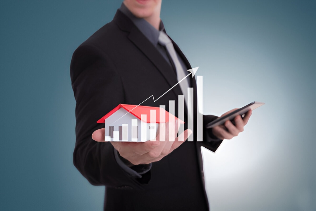 Two people discussing property paperwork with a miniature house model, showcasing homes for sale with no bank financing at KBR Investing. Two people discussing property paperwork with a miniature house model, showcasing homes for sale with no bank financing at KBR Investing.