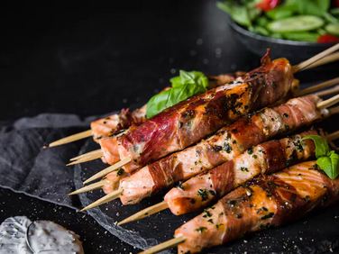 Prosciutto-wrapped salmon skewers