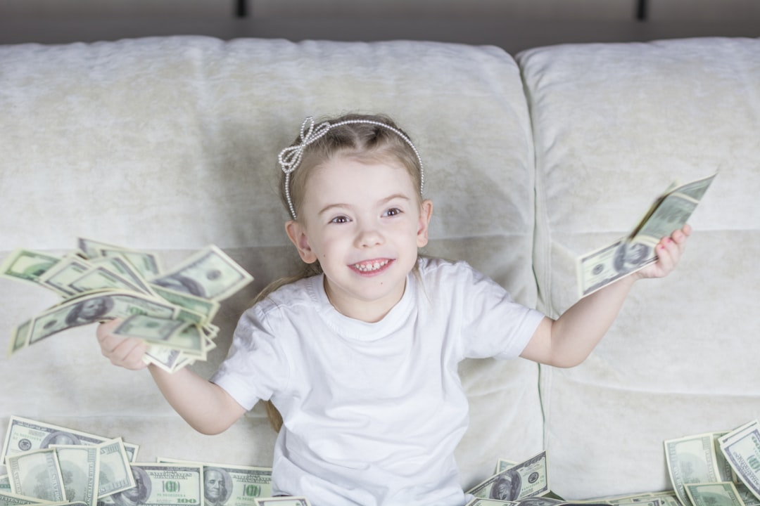 Girl with money after chores Girl with money after chores