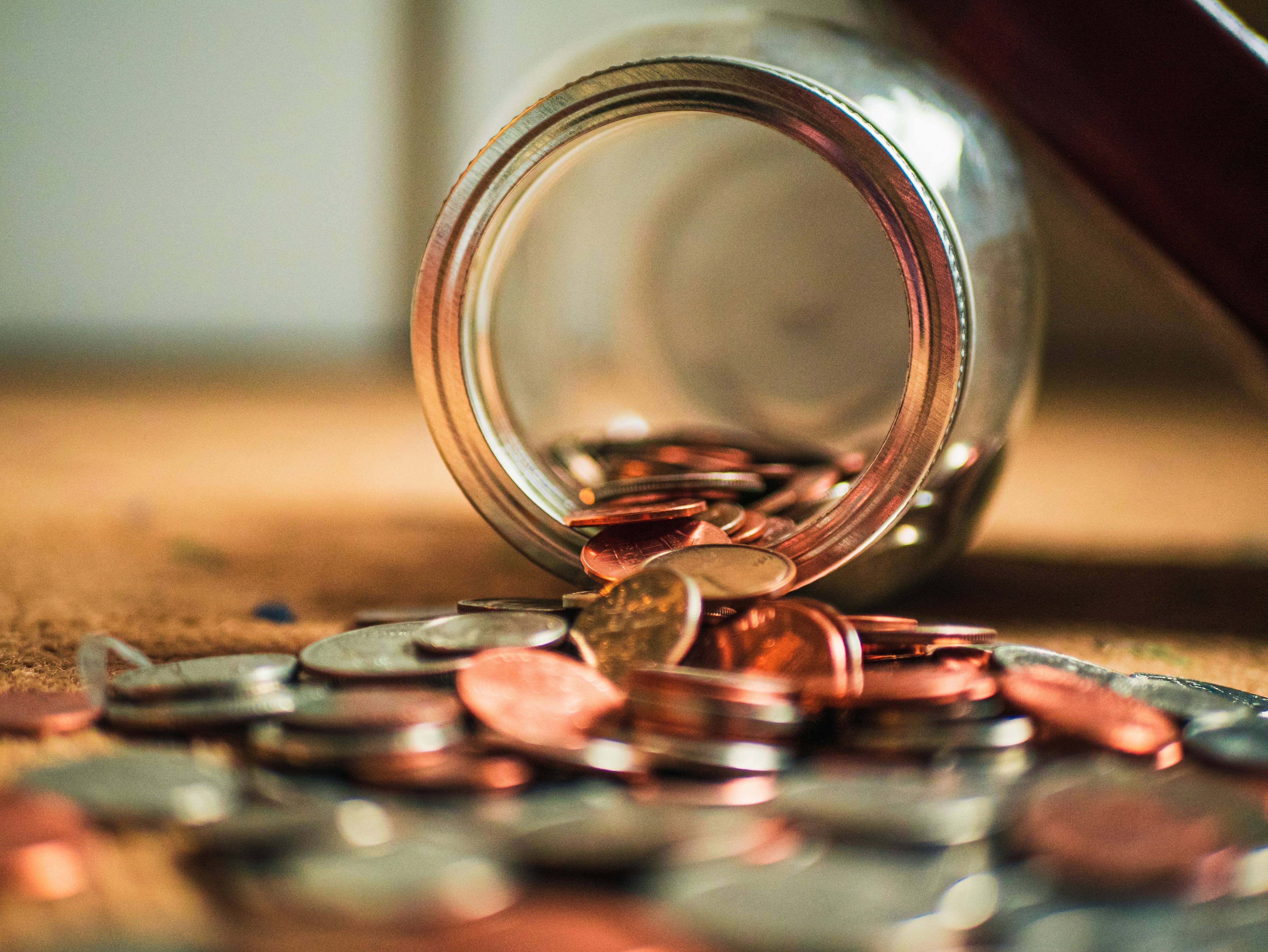 Jar overflowing with savings Jar overflowing with savings