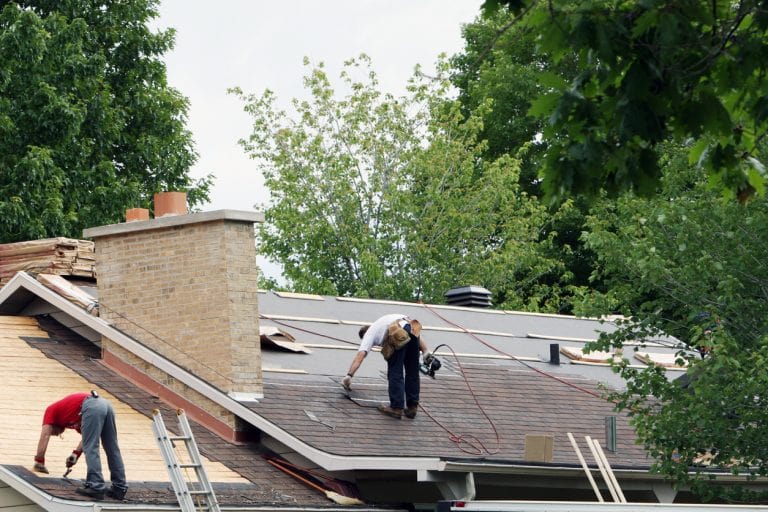 an expert contractor on the roof