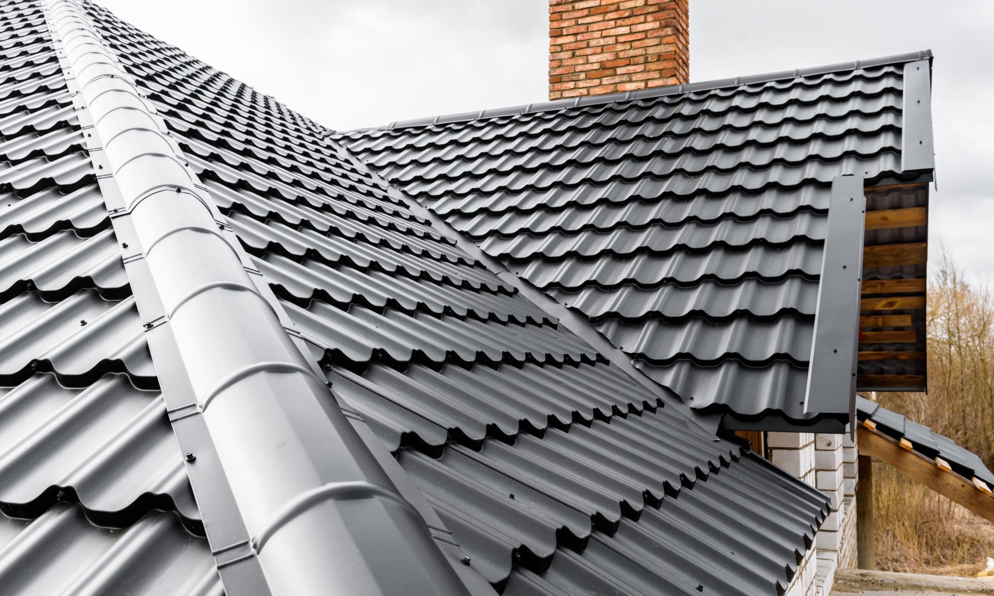 a newly installed metal roofing of a house