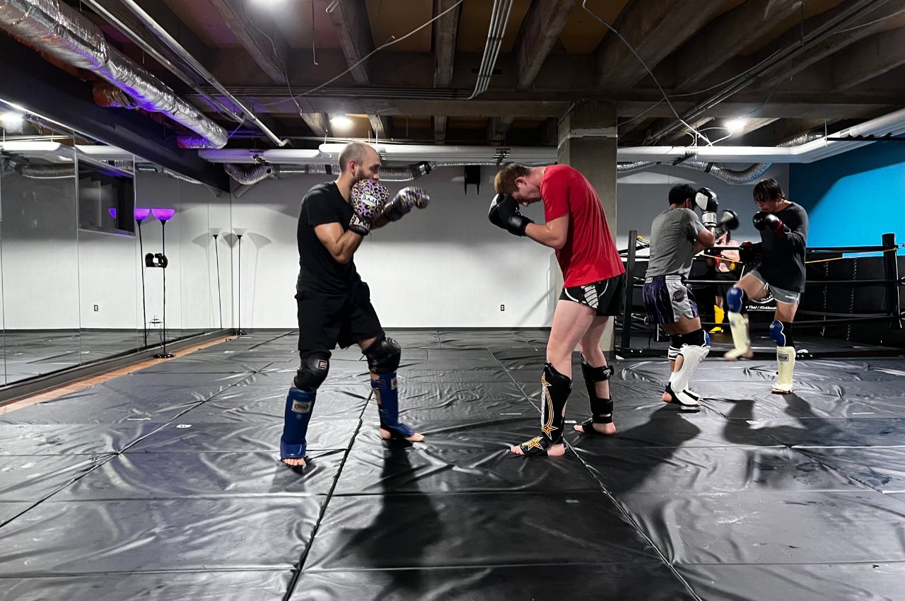 Martial arts instructor with kids