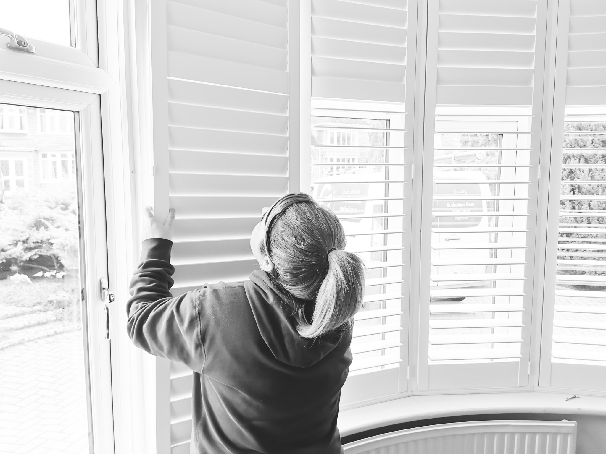 lady fitting blinds