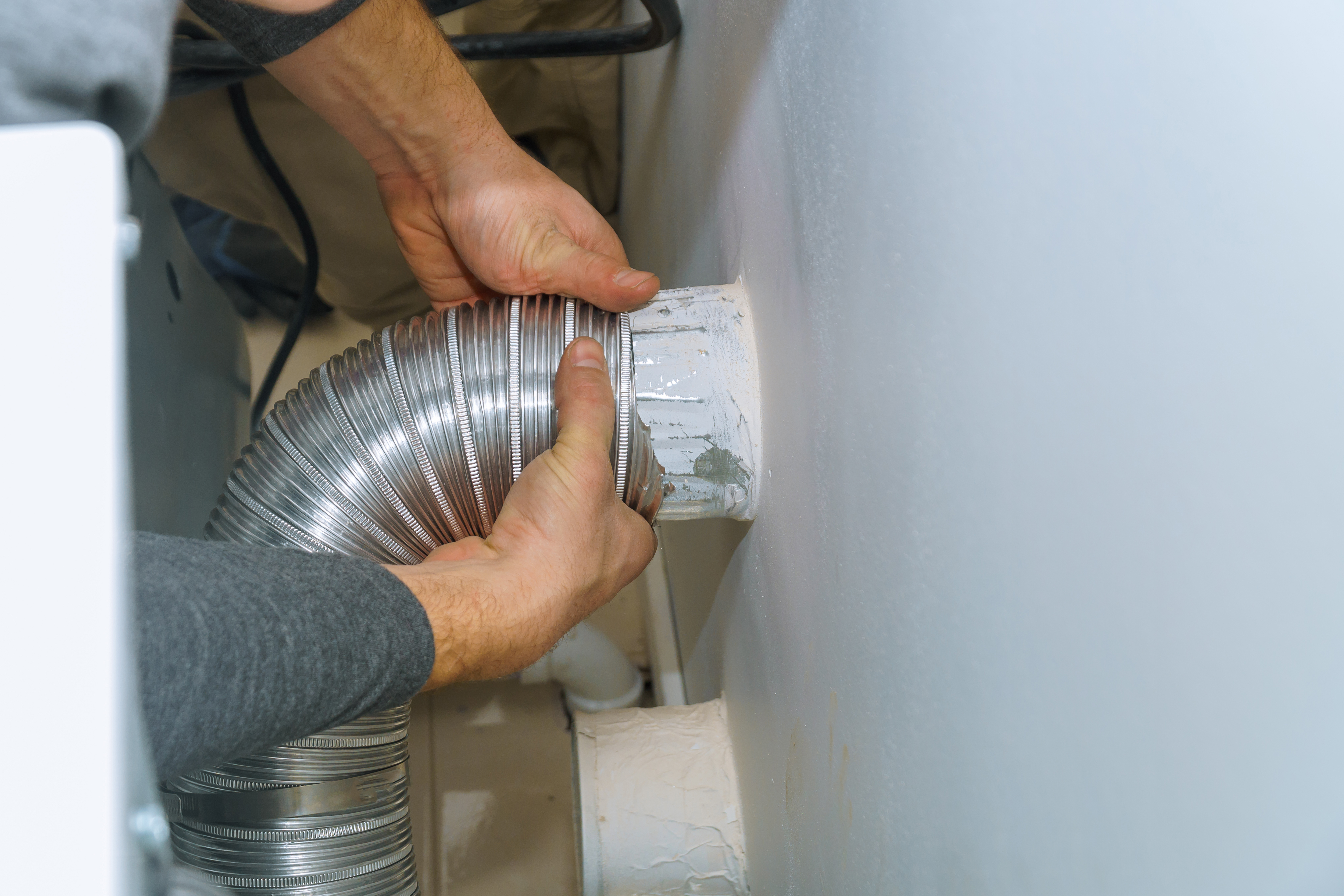 Dryer Vent Ninjas connecting dryer vent hose Dryer Vent Ninjas connecting dryer vent hose