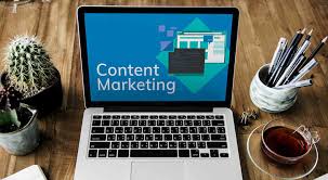the words content marketing shown on the screen of a laptop the words content marketing shown on the screen of a laptop