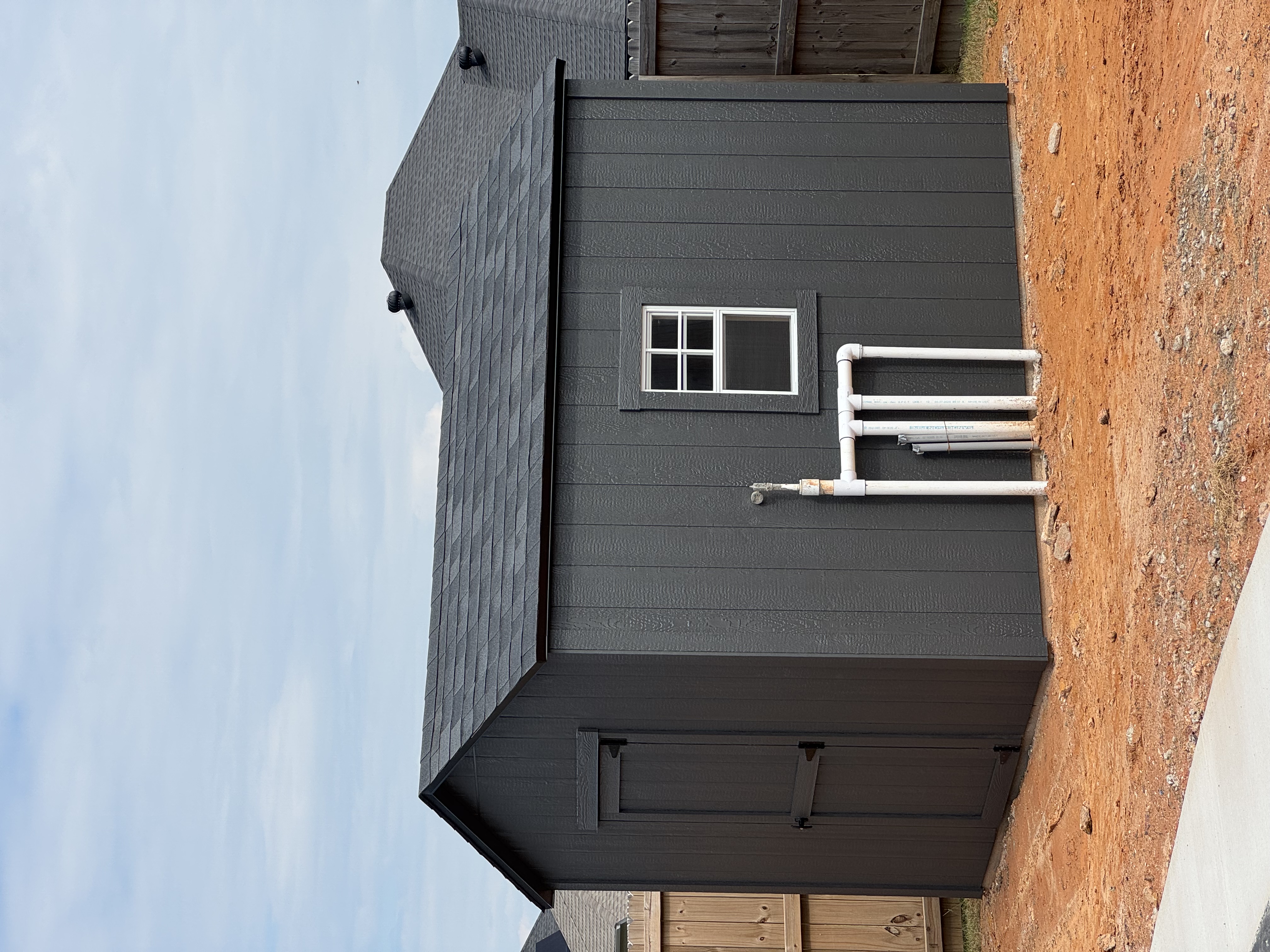 Finished outdoor portable building with custom paint