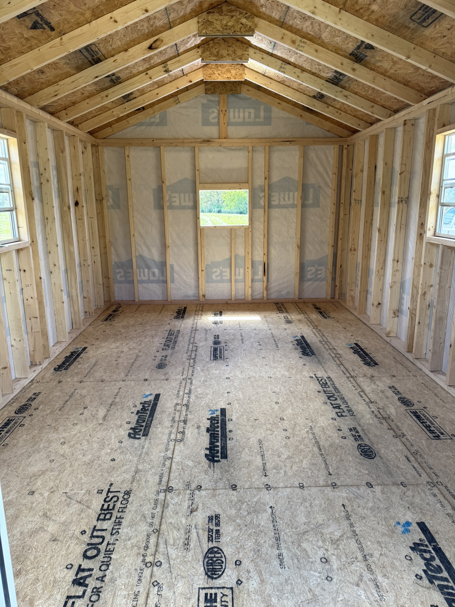 Insulated workshop shed interior with proper ventilation and vapor barrier Insulated workshop shed interior with proper ventilation and vapor barrier