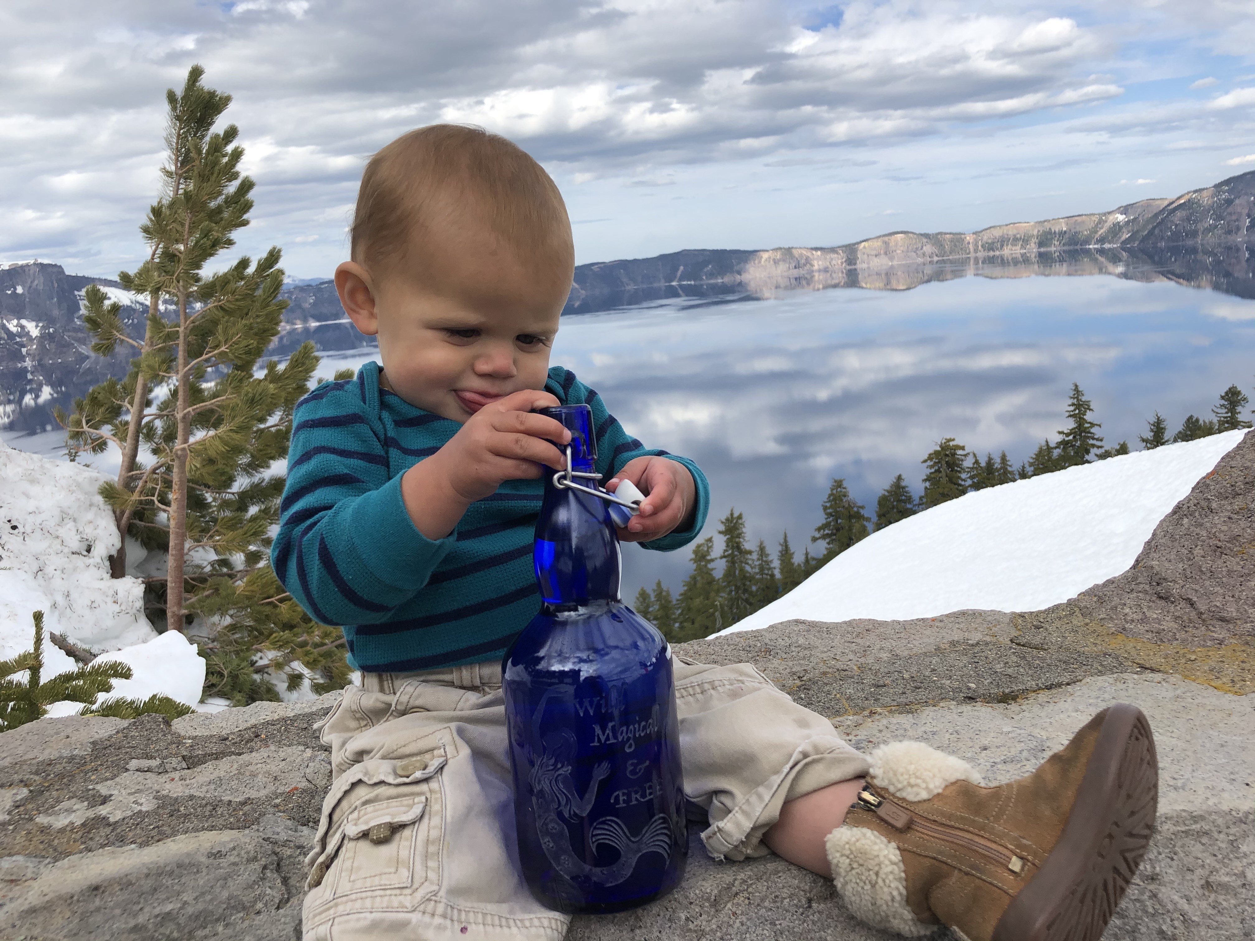blue glass water bottle