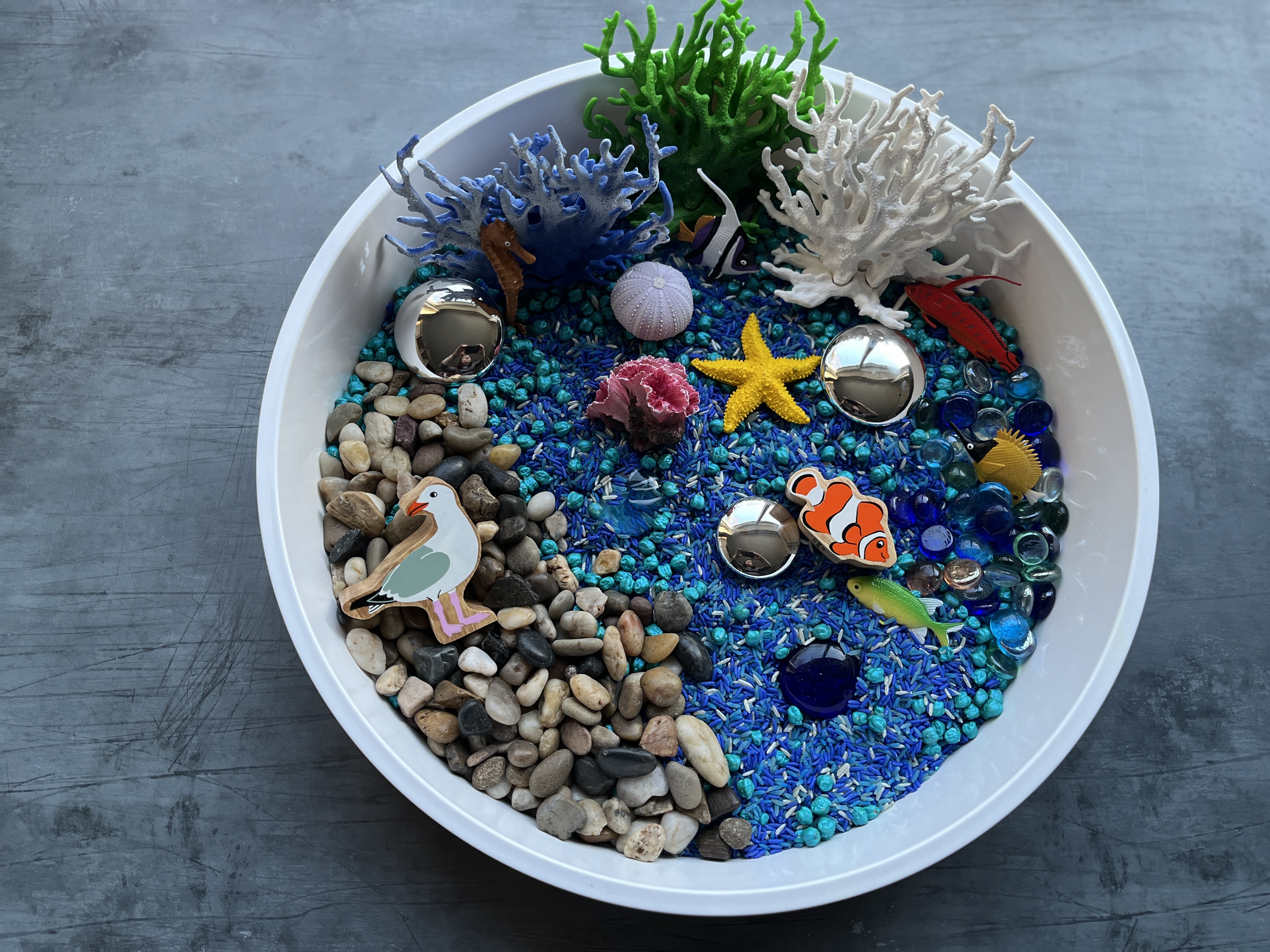 An under the sea themed sensory play tray set up using Time to Play Sensory's "Aqua Serenity" sensory mix plus small world accessories. An under the sea themed sensory play tray set up using Time to Play Sensory's "Aqua Serenity" sensory mix plus small world accessories.