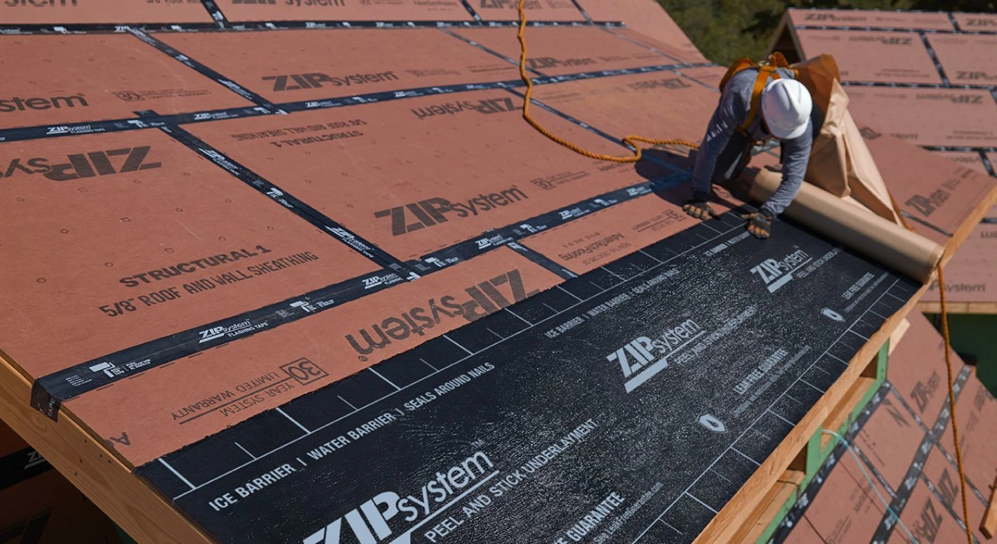 an expert roofer on a roofing job