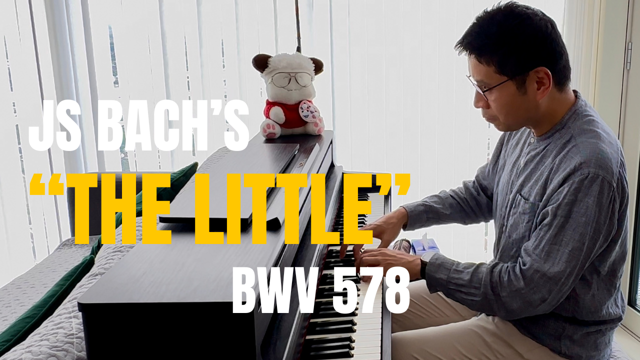 Sheung Yuen Lee playing piano in a bright home studio with “Fat Ying” (Ohayo Spank plush toy) on top of the piano, overlaid with text “JS Bach’s ‘The Little’ BWV 578.”