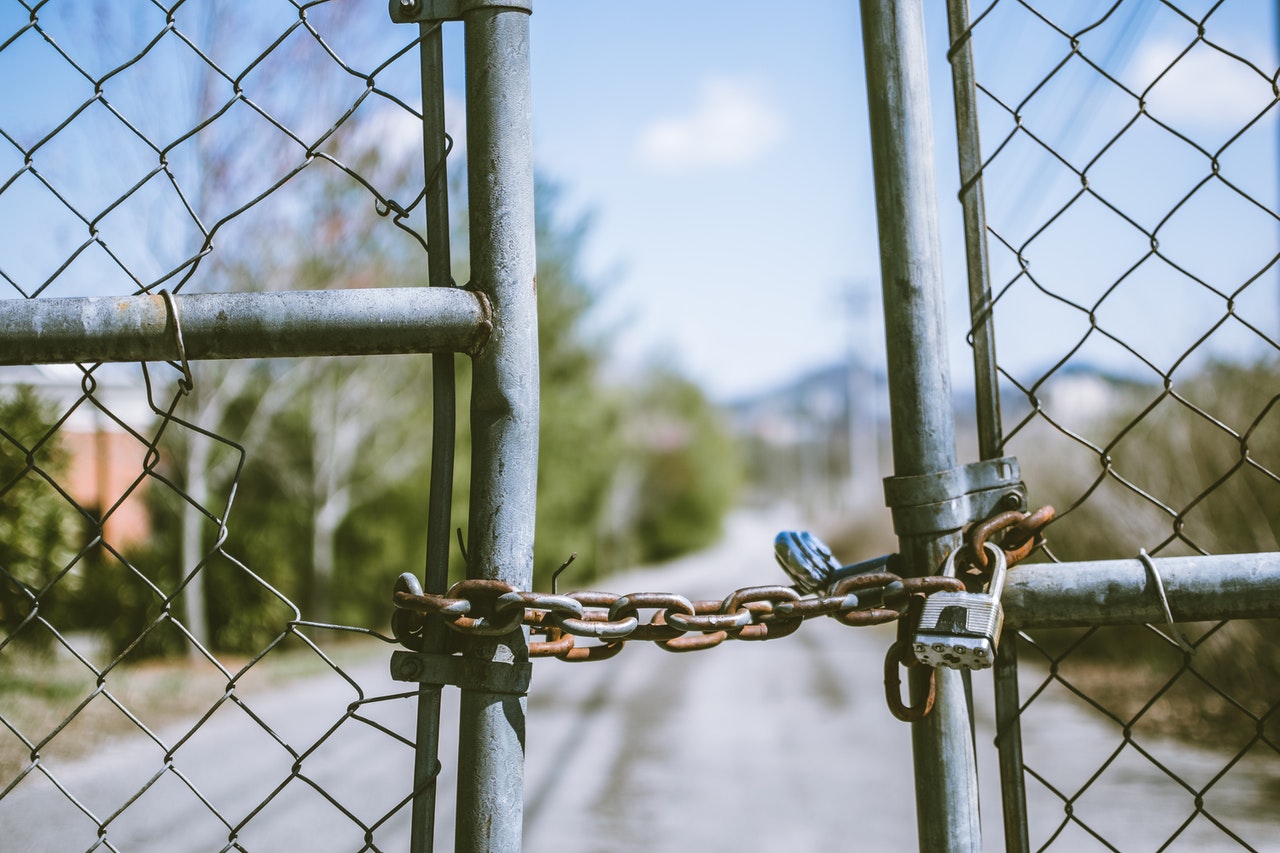 Chain link fence with a lock Chain link fence with a lock