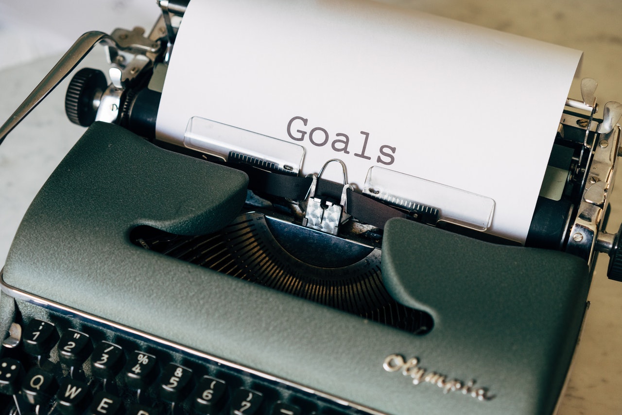 A typewriter shows the word Goals A typewriter shows the word Goals