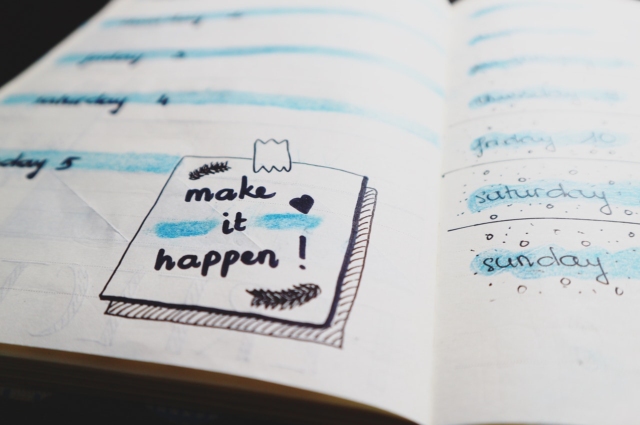 A handwritten journal and calendar book A handwritten journal and calendar book
