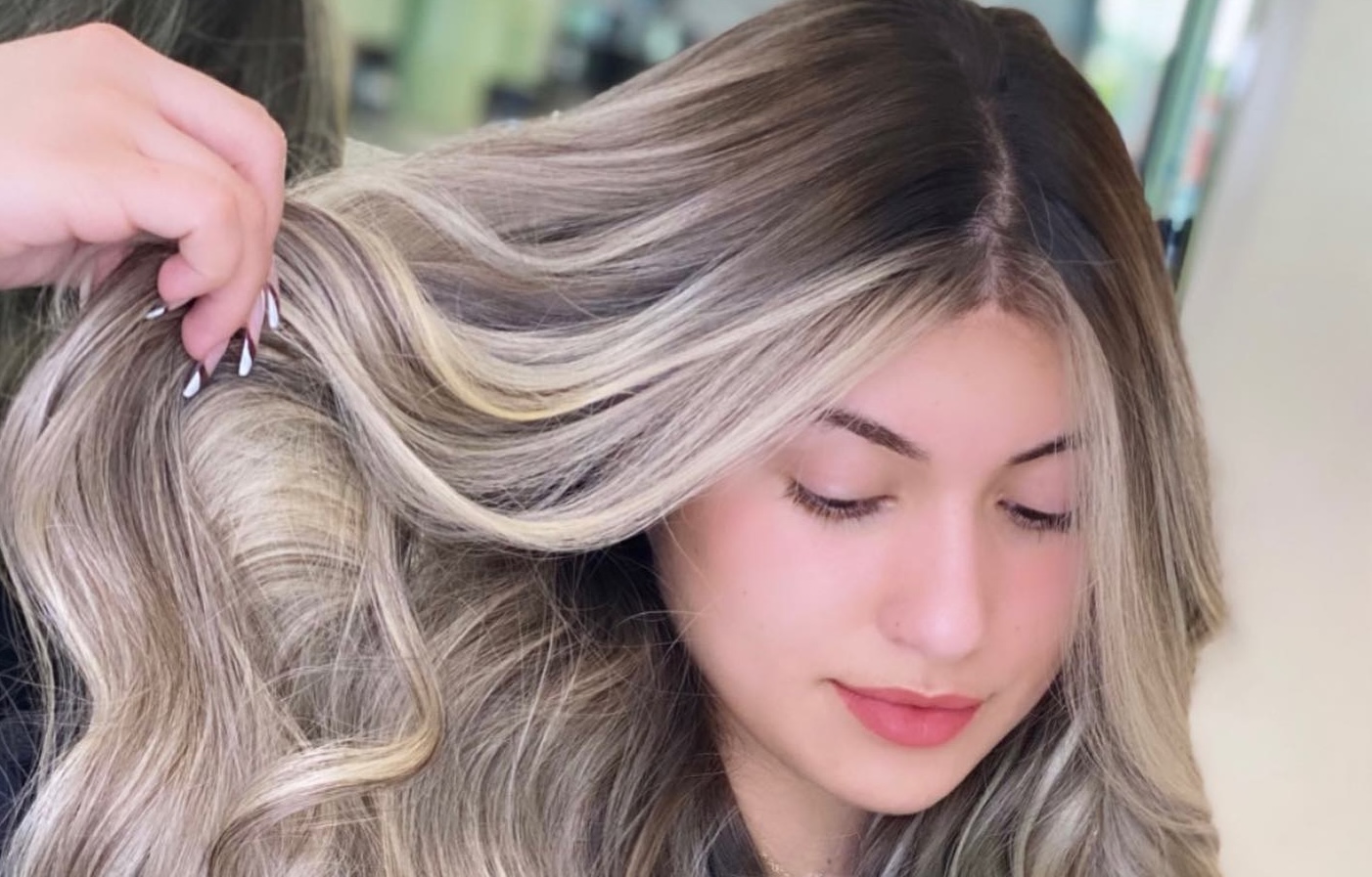 blond woman with hair treated in Darma Salon