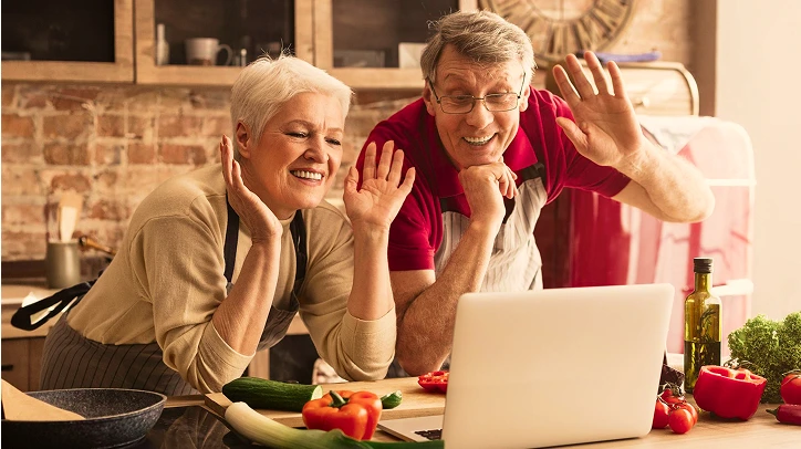 Happy couple cooking together