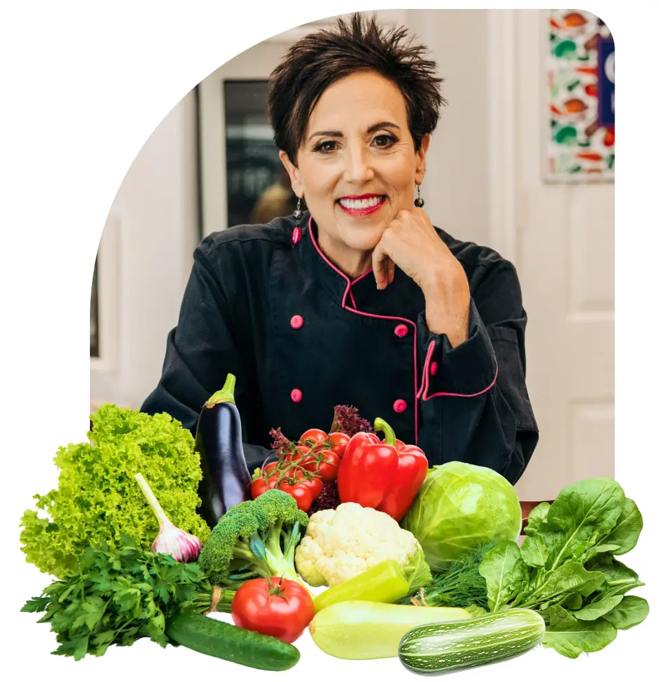 Chef AJ with fresh vegetables