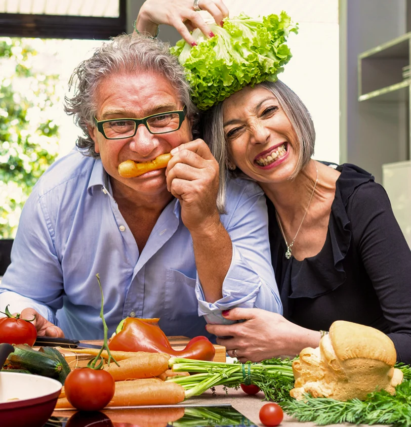 Happy couple eating healthy food