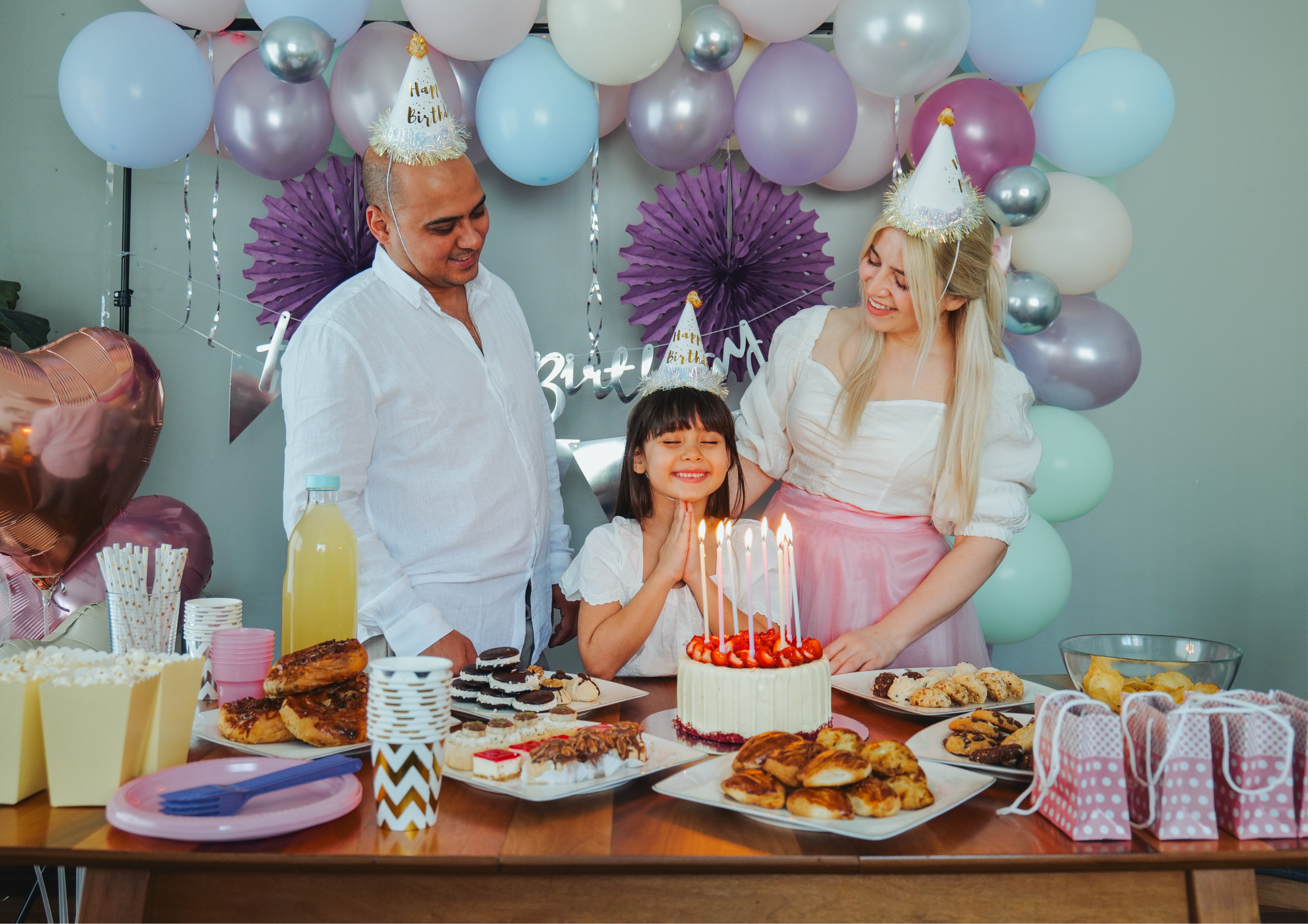Happy family enjoying a birthday party while venue staff handles everything Happy family enjoying a birthday party while venue staff handles everything