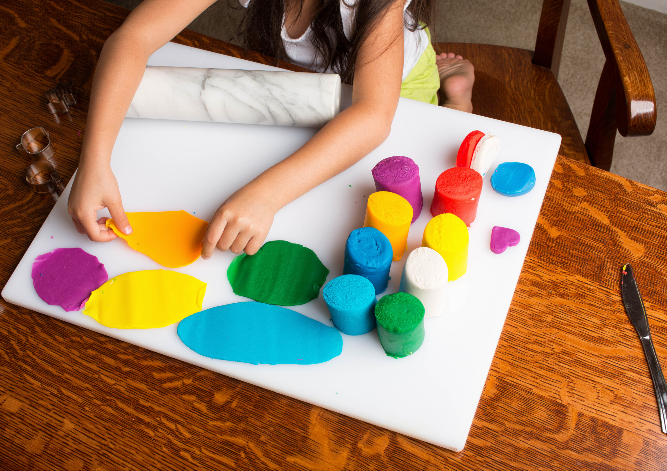 Children enjoying play-dough activities at a party Children enjoying play-dough activities at a party