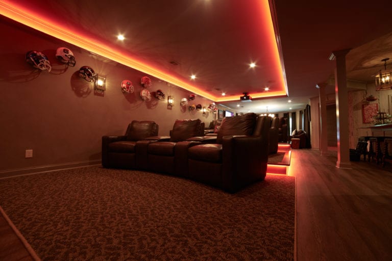 Man cave with LED lights under theater