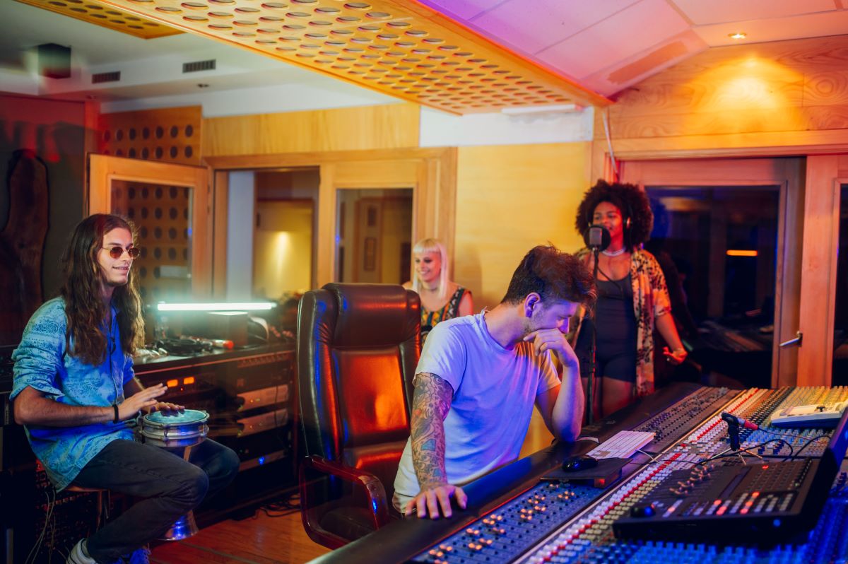 musicians in well designed studio control room