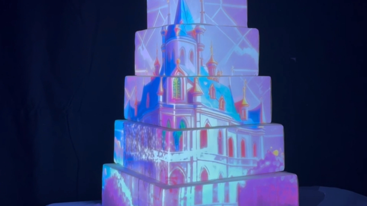 castle on cake projection mapped