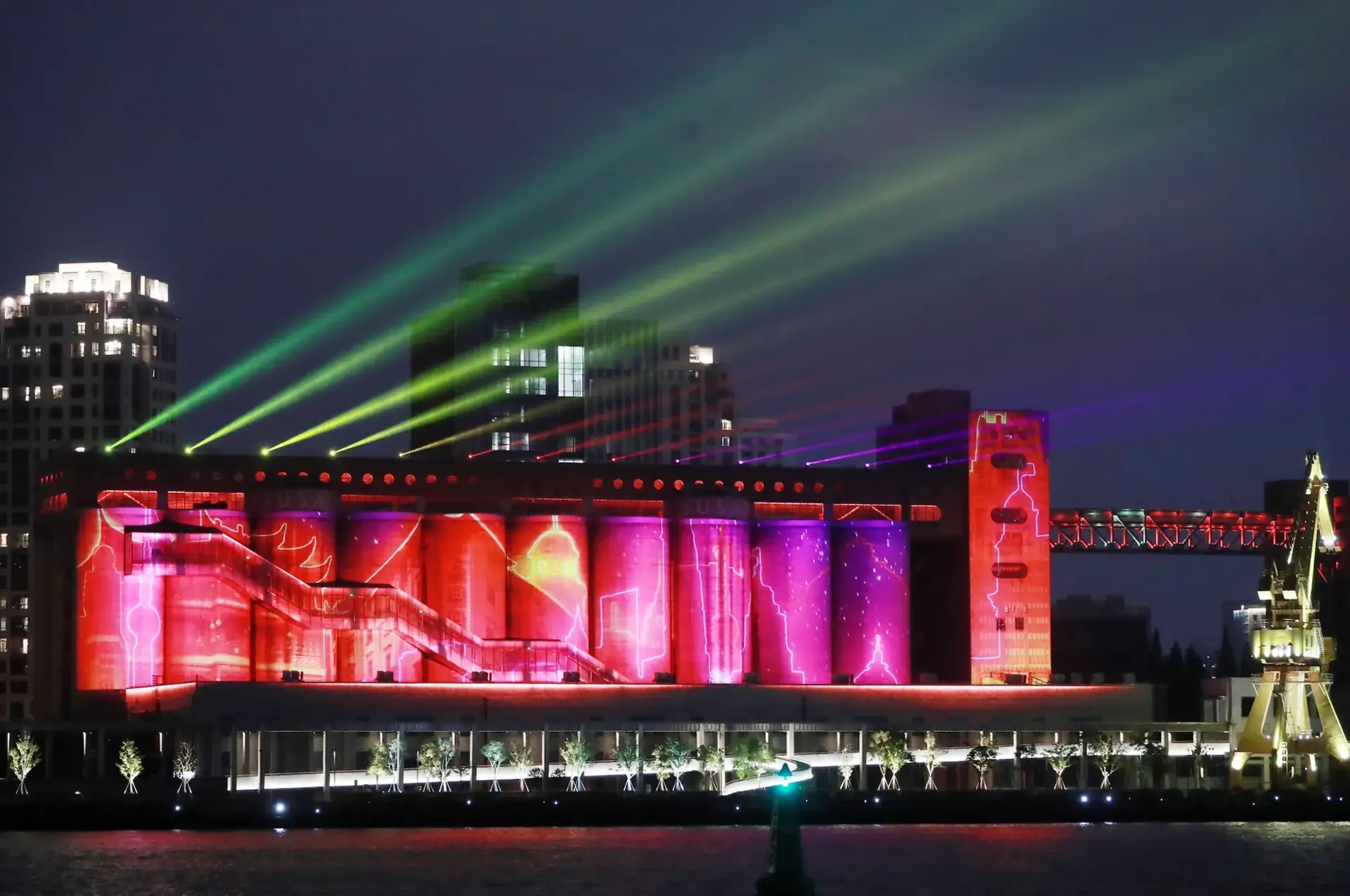 silo warehouse video mapped at night