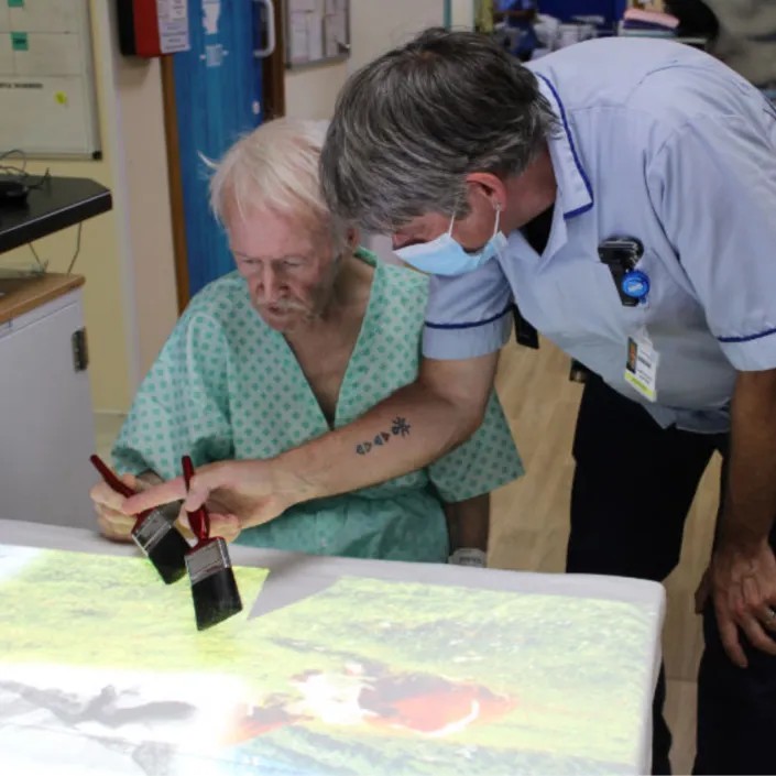 man in recovery uses interactive projection activity man in recovery uses interactive projection activity