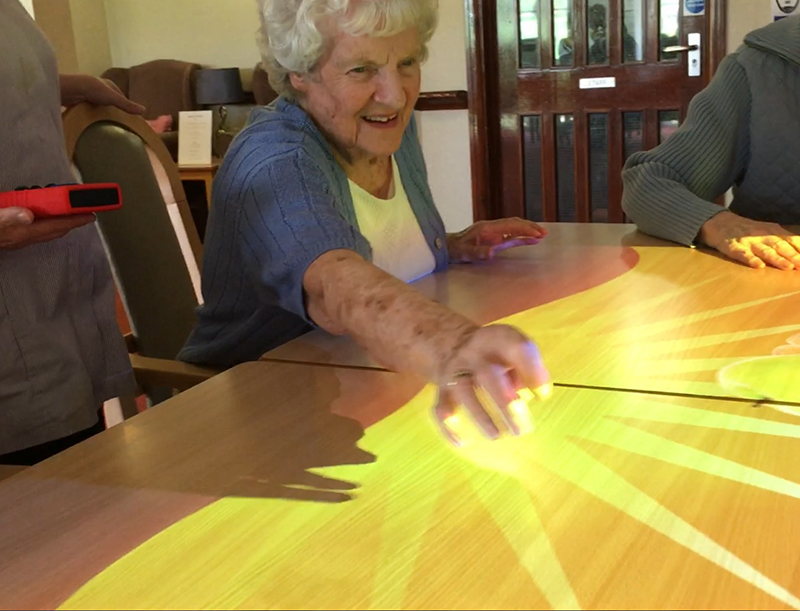 woman in rehabilitation engaging in projection activity woman in rehabilitation engaging in projection activity