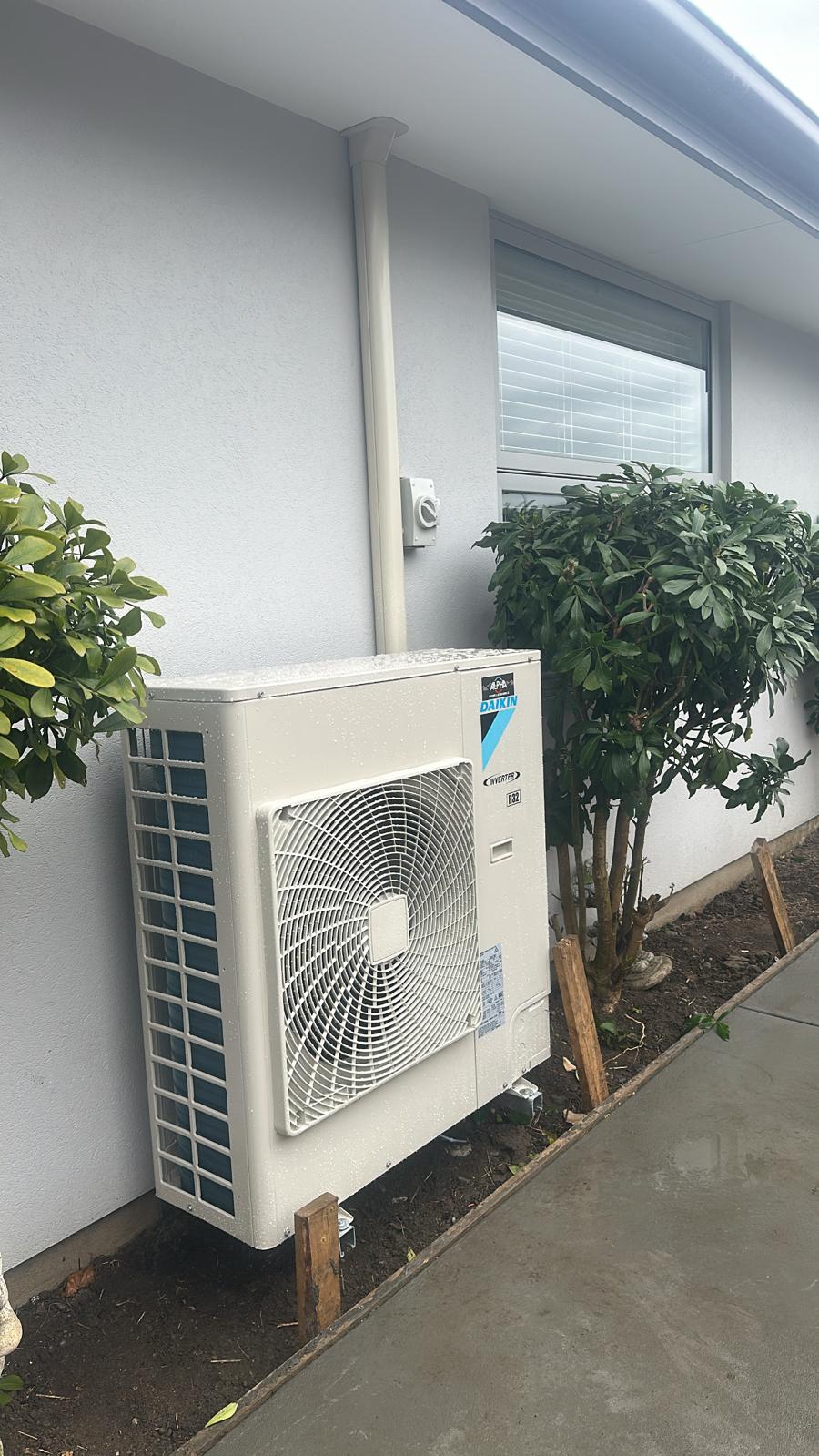 Modern heat pump installation in Christchurch residential property