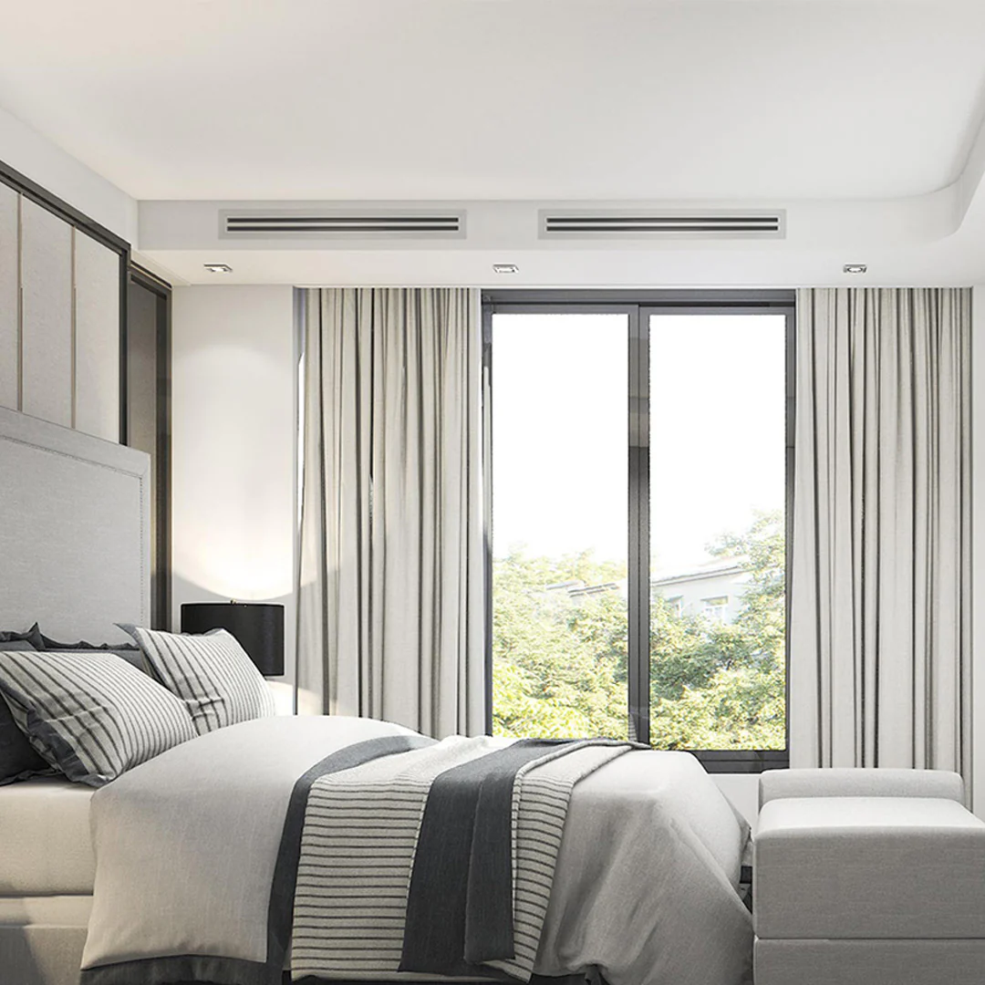 Ducted heat pump system components showing professional installation