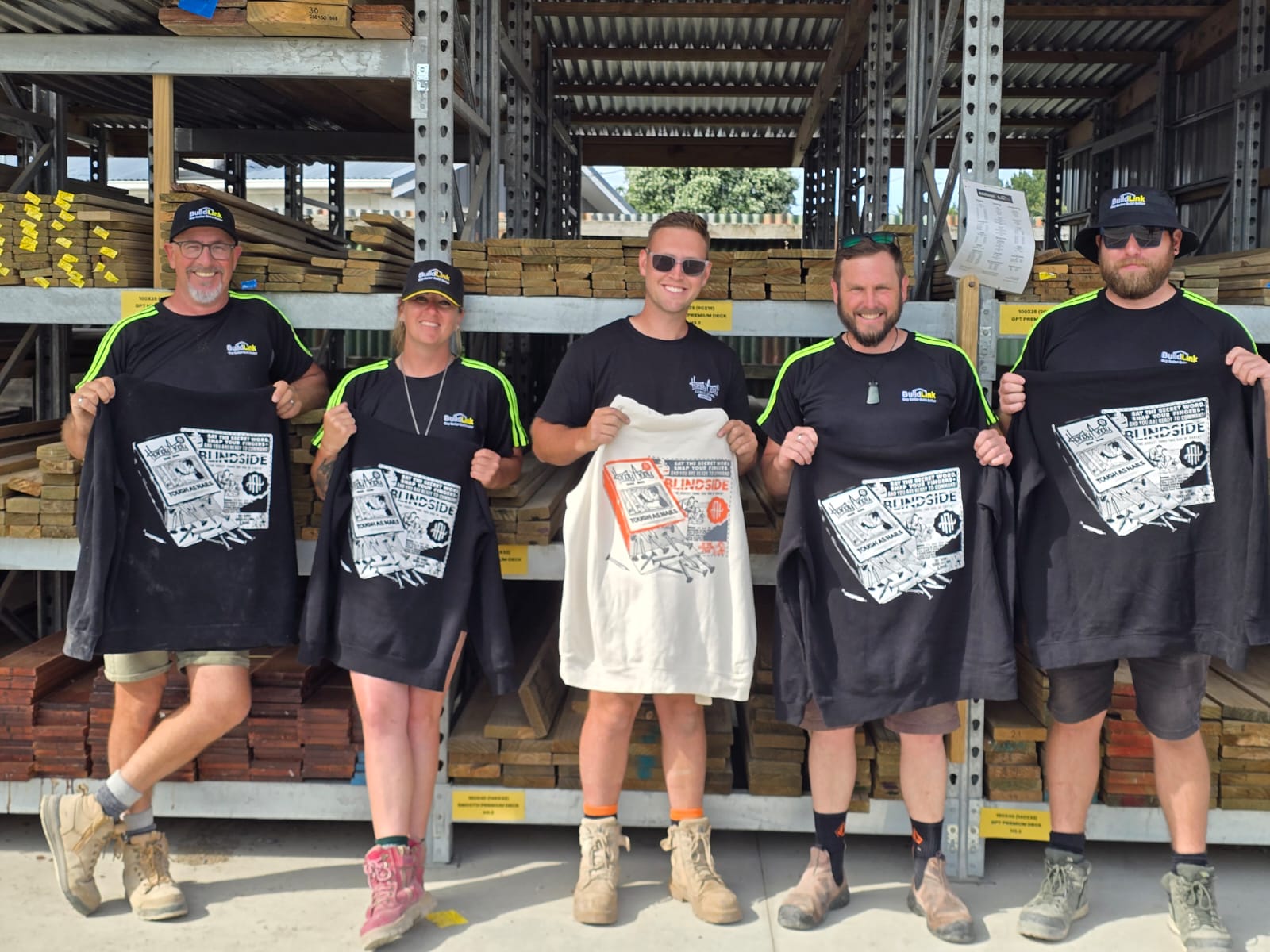 Andy and BuildLink team with DSG hoodies