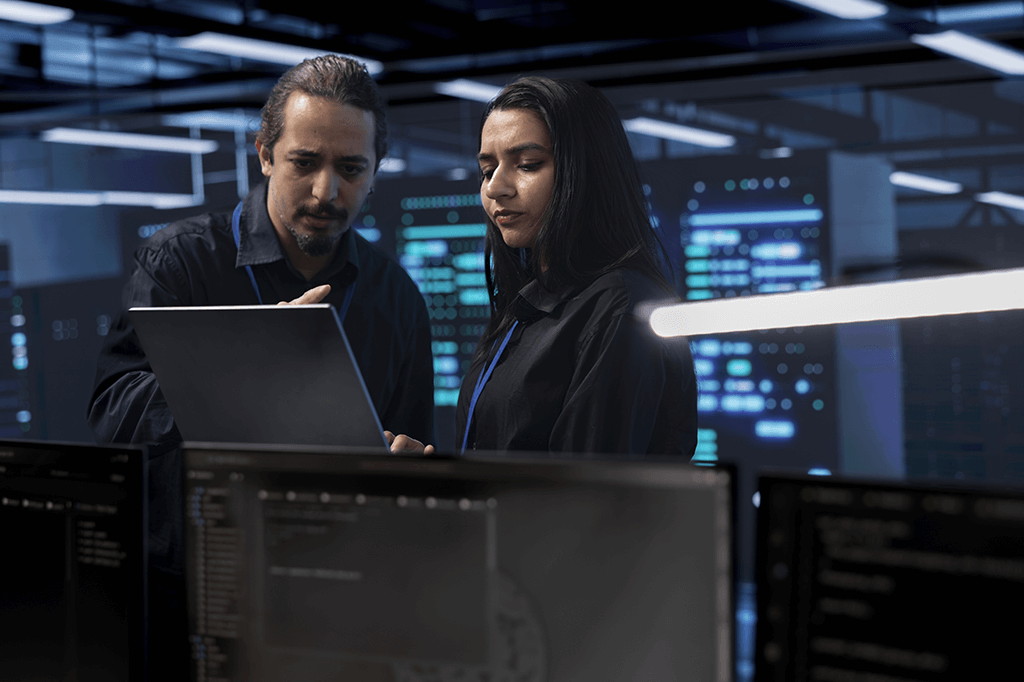 Cybersecurity specialists review a system for intrusion attempts and vunerabilities Cybersecurity specialists review a system for intrusion attempts and vunerabilities