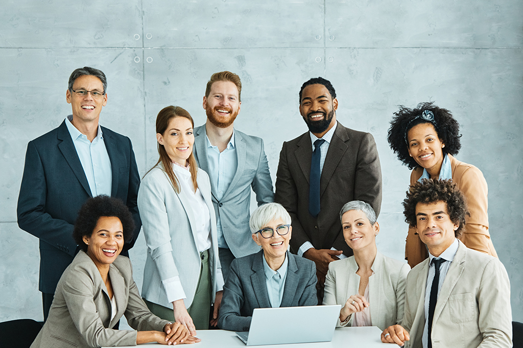 A diverse board of directors at a nonprofit smile after wrapping up recruitment with data-driven hiring. A diverse board of directors at a nonprofit smile after wrapping up recruitment with data-driven hiring.