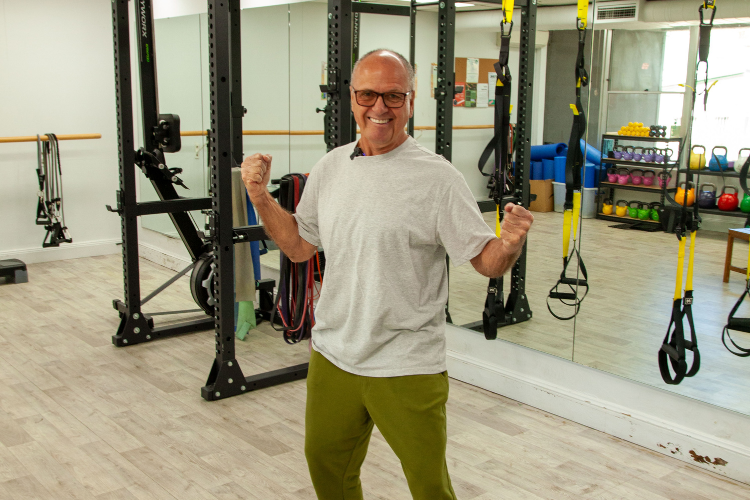 David, a member at Community Moves, enjoys the workouts and shows his energy, reflecting his active and joyful experience at Community Moves Health & Fitness. David, a member at Community Moves, enjoys the workouts and shows his energy, reflecting his active and joyful experience at Community Moves Health & Fitness.
