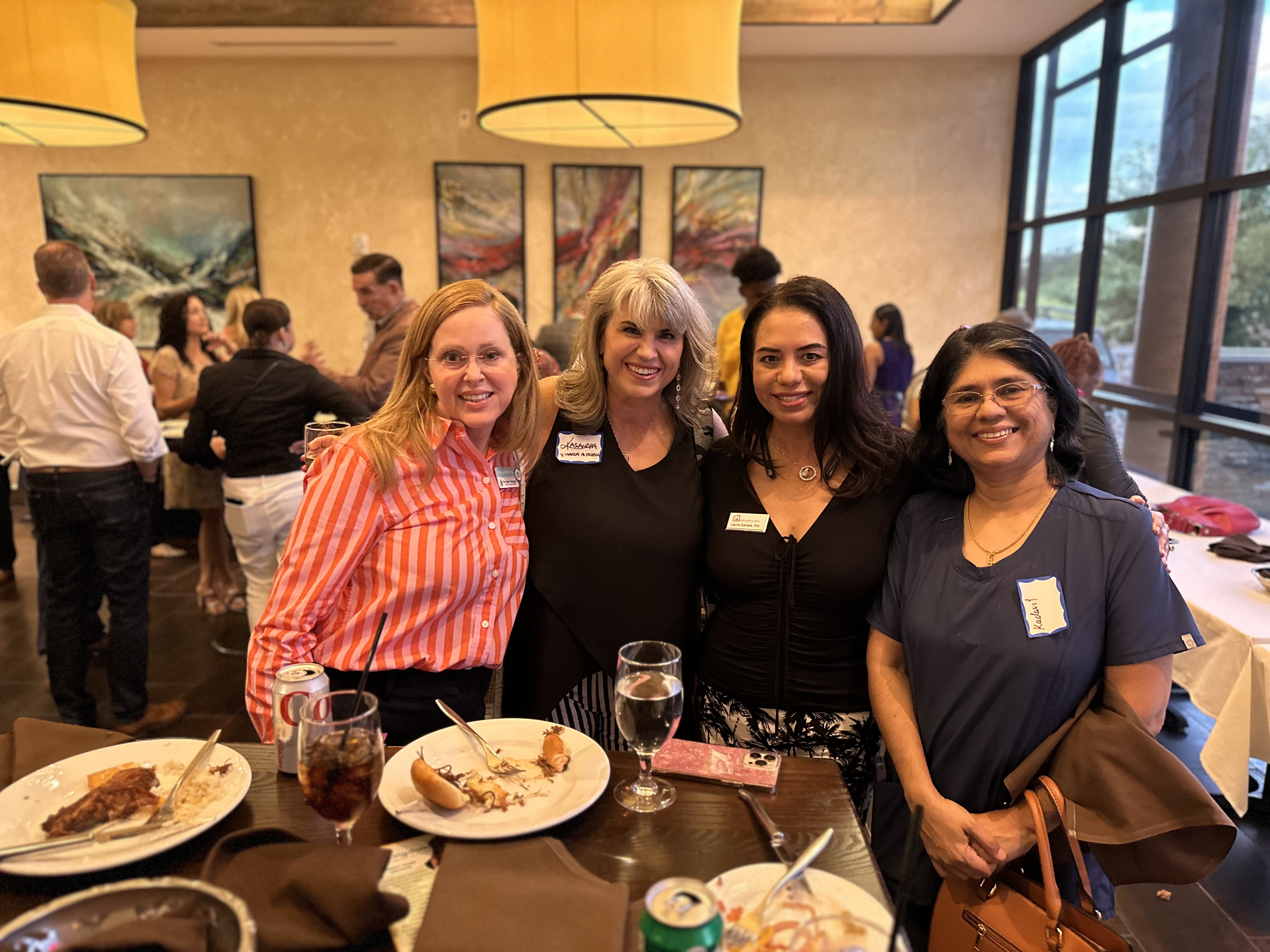 Kasandra Vitacca Mitchell poses with attendees