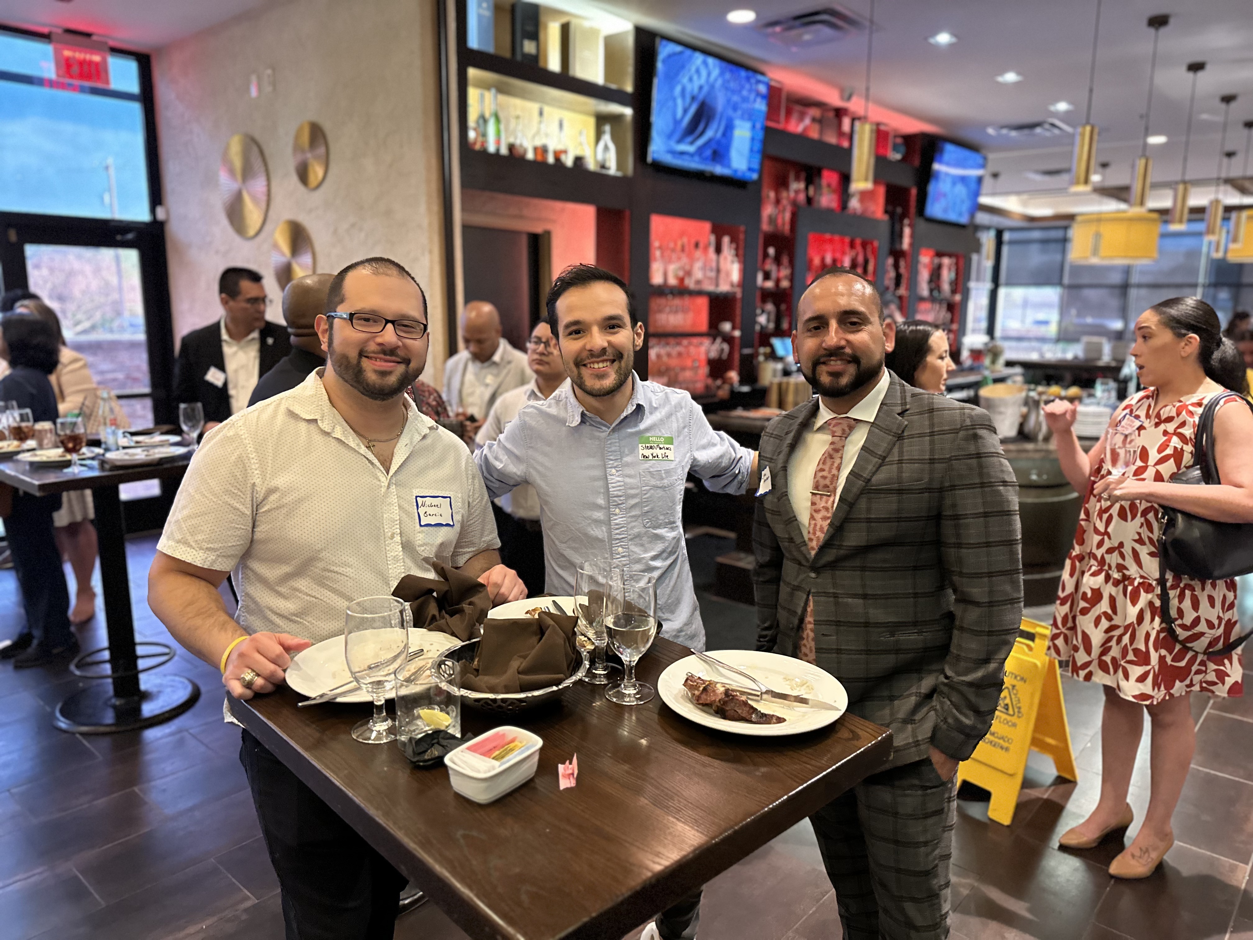 Three men pose together at the SA FMMA End of Summer Mixer