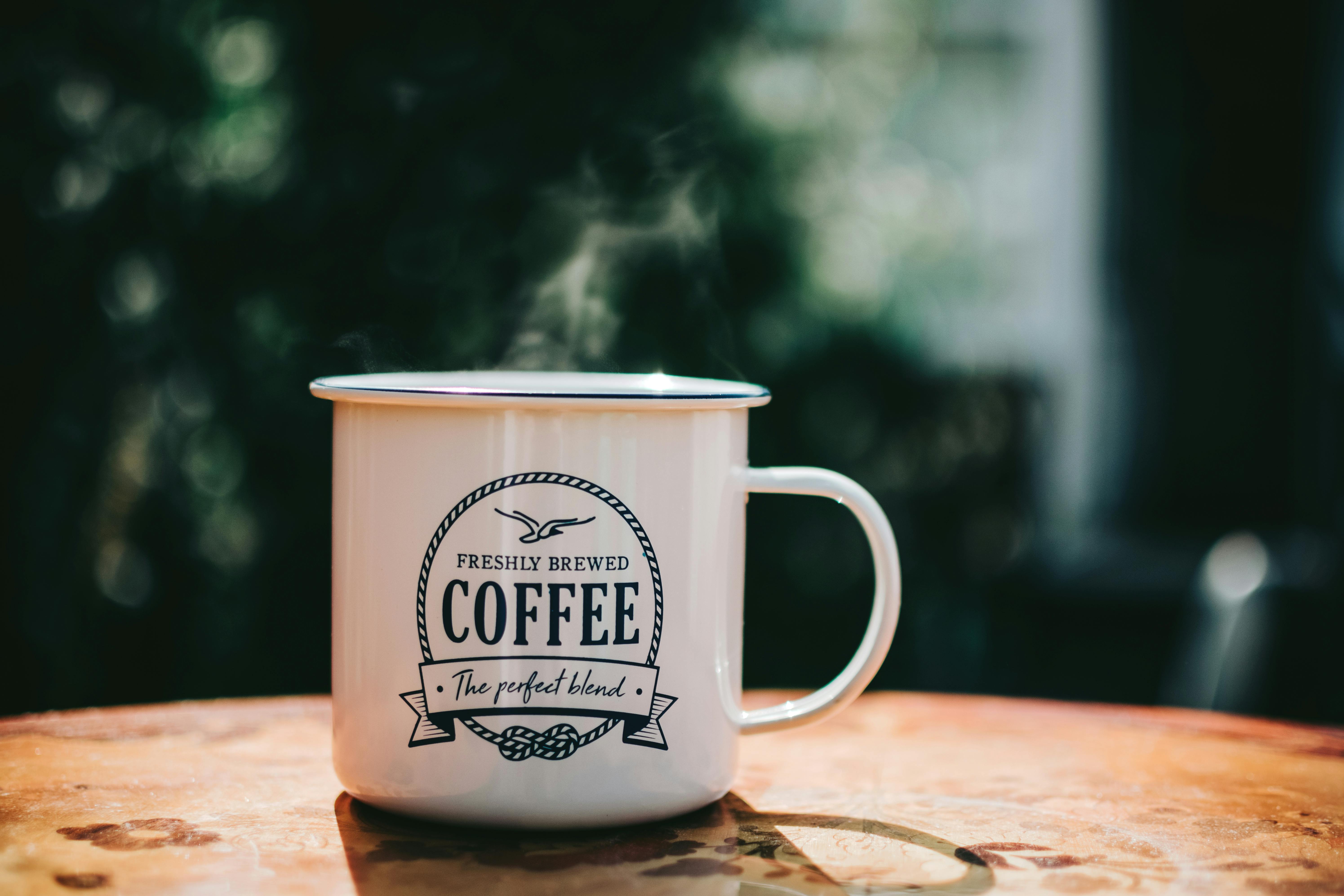 Coffee cup steaming to support blog Why Does Coffee Make ADHD People Tired or Sleepy?
