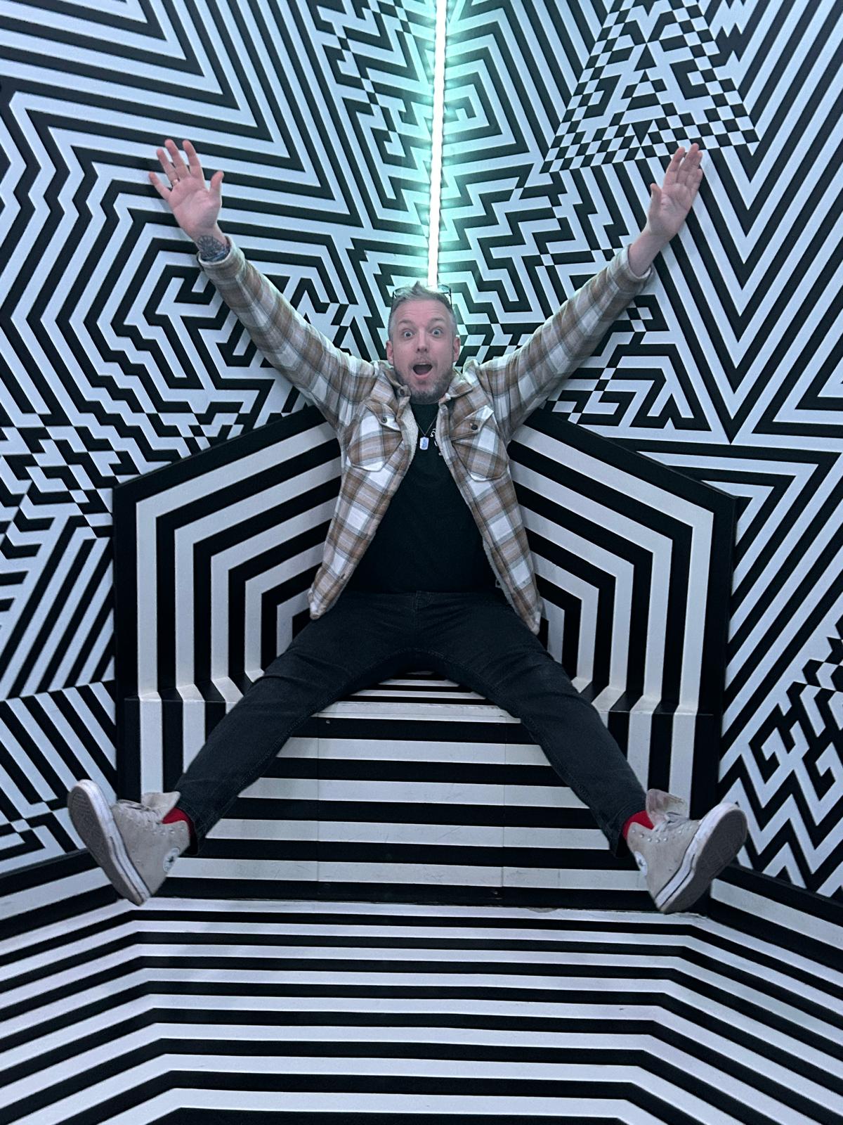 Fraser Nicoll in optical illusion of white and black stripes to support blog post ADHD vs High Functioning Autism: Key Differences Explained