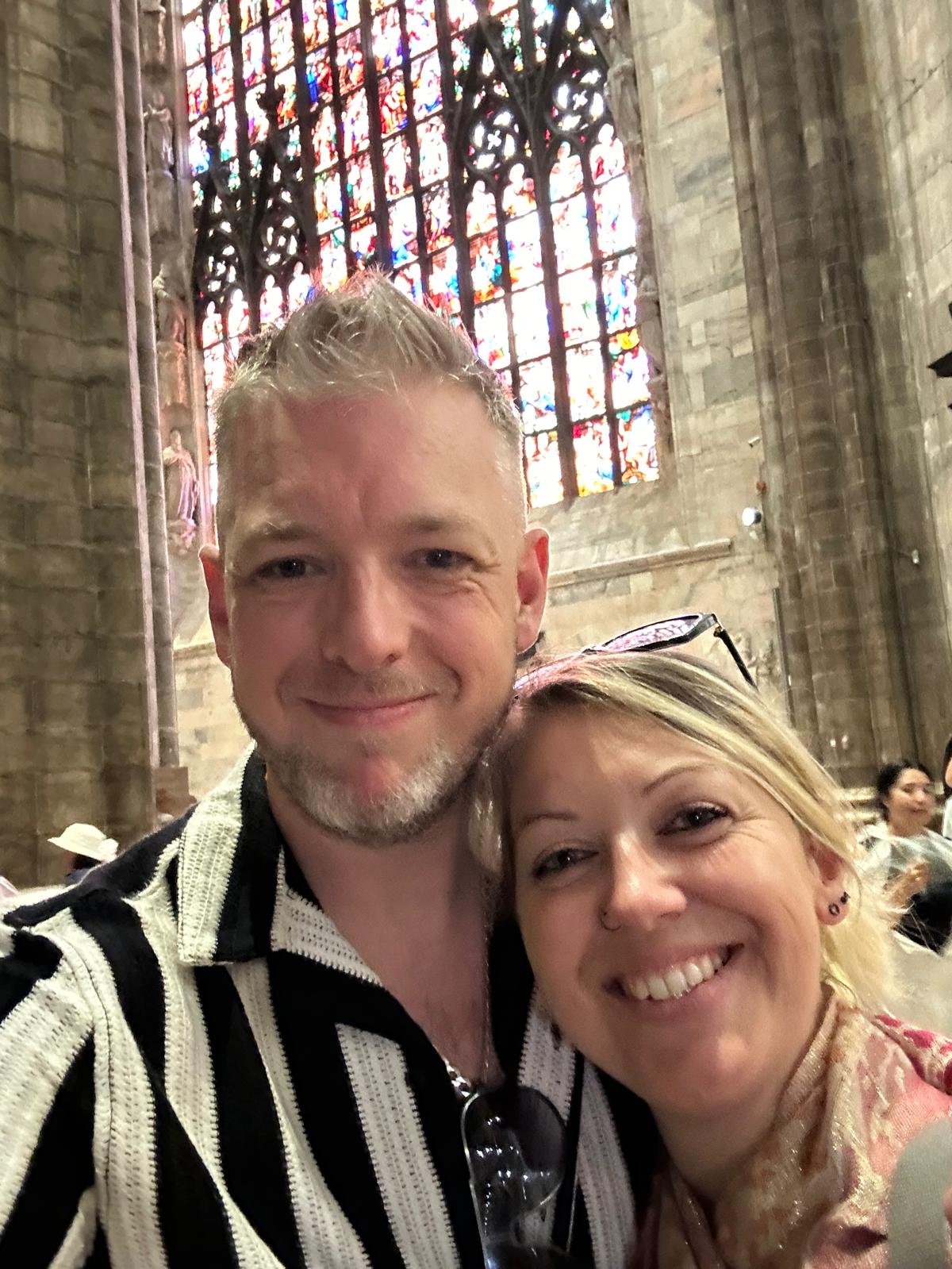 Fraser Nicoll and Louise Williams posing for a smile to support blog post What ADHD Coaching Is and How to Find a Coach