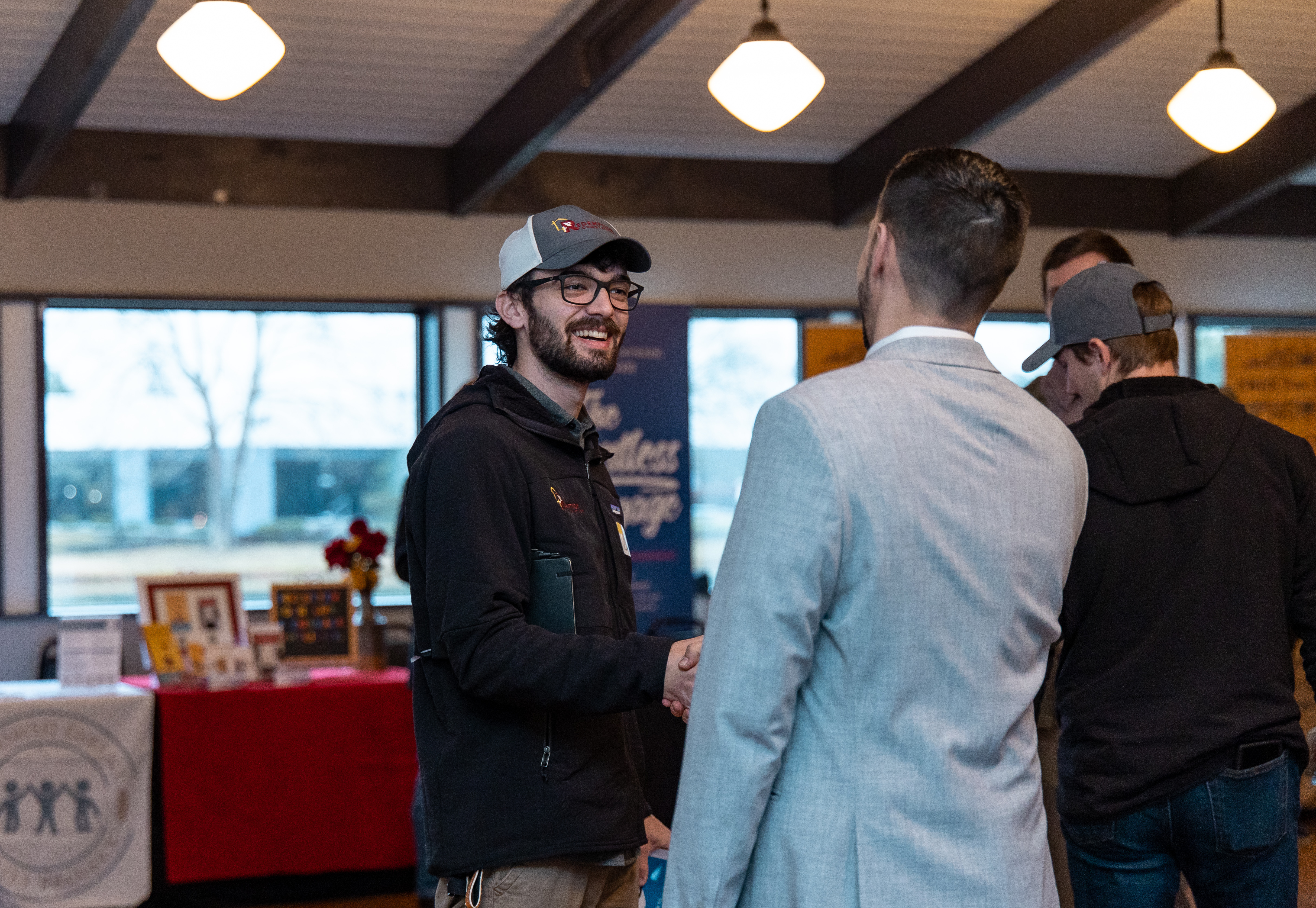 Man smiling at conference