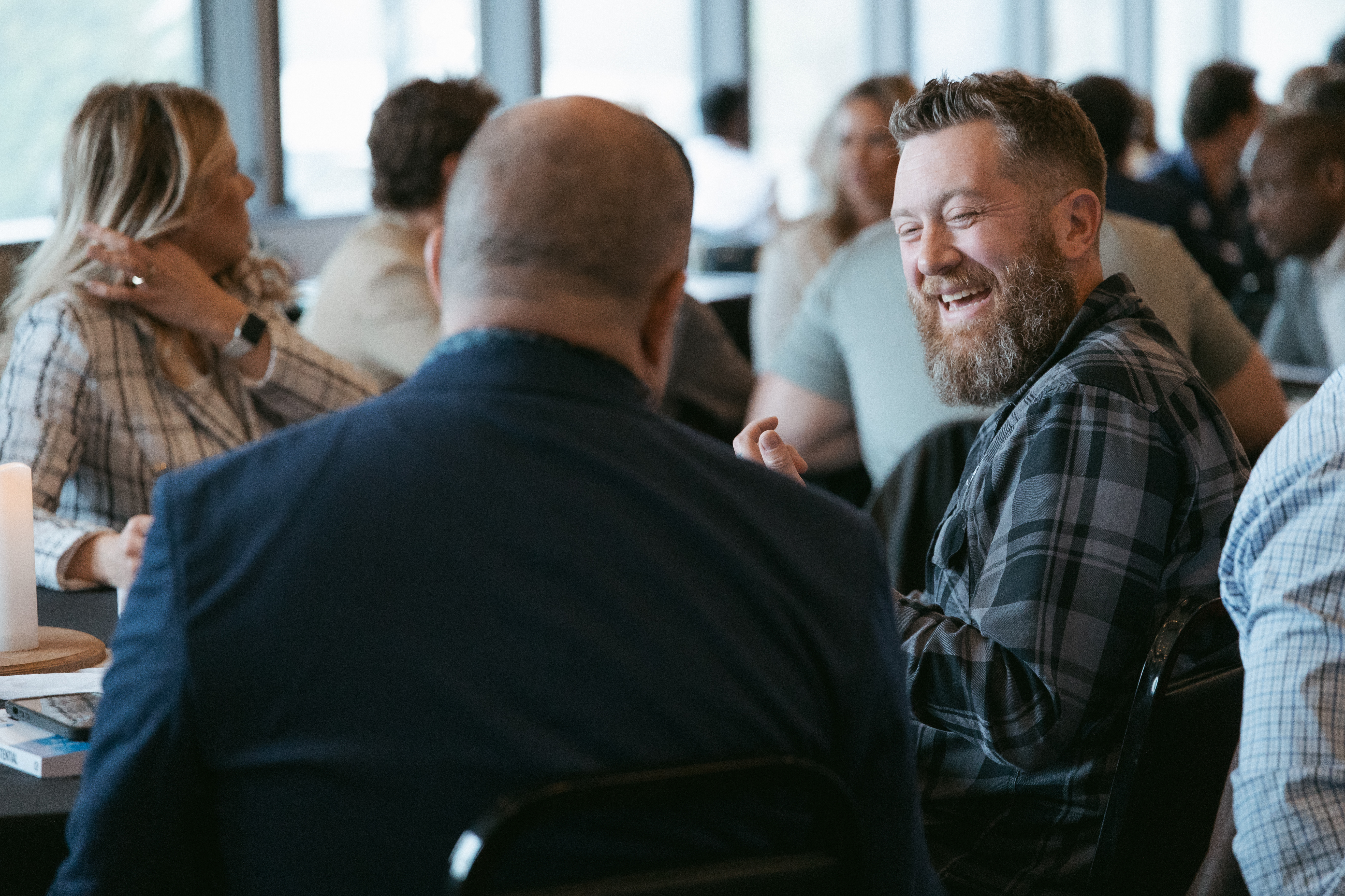 Close up of two attendees talking