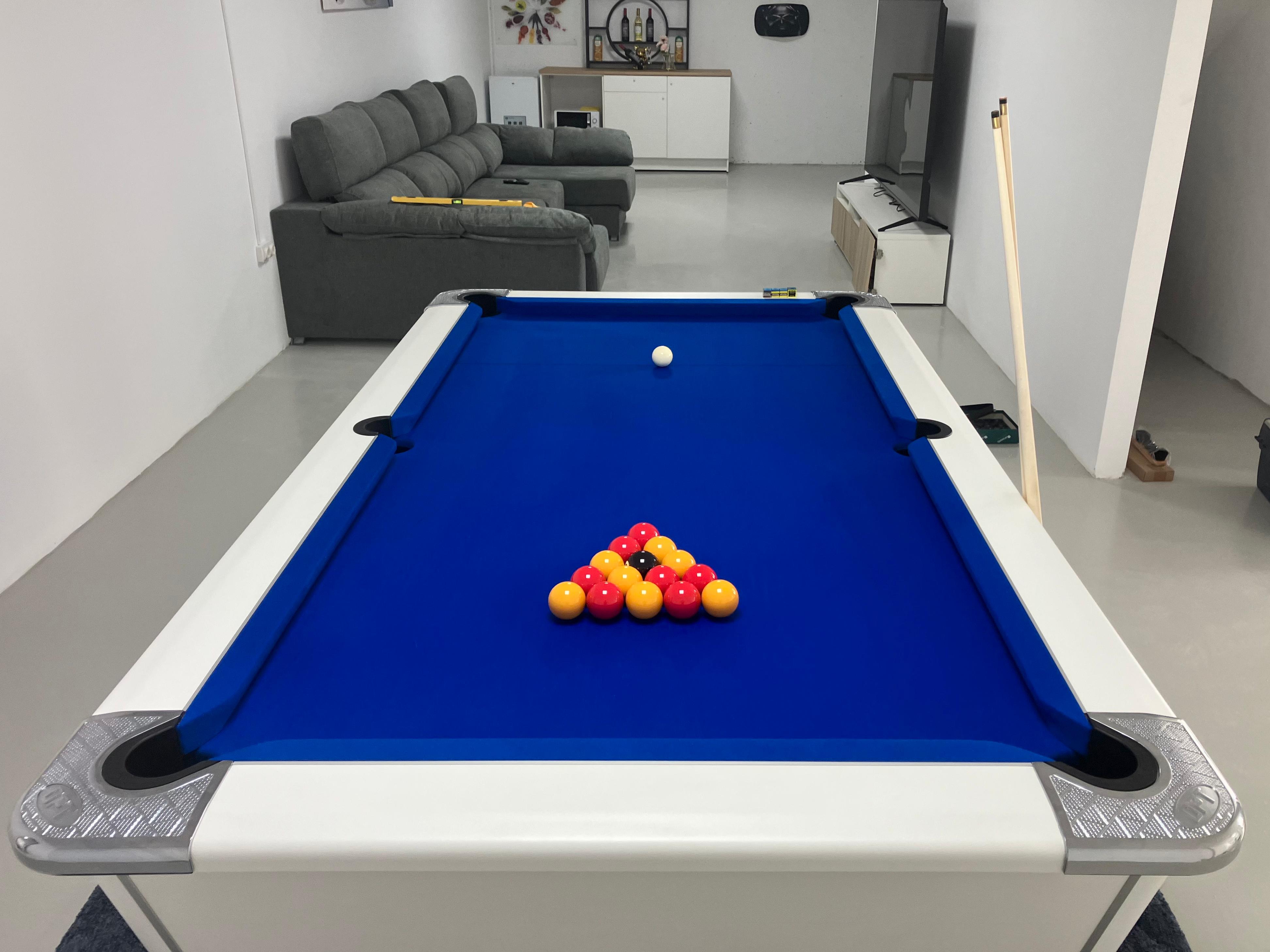 white titan pool table with blue cloth