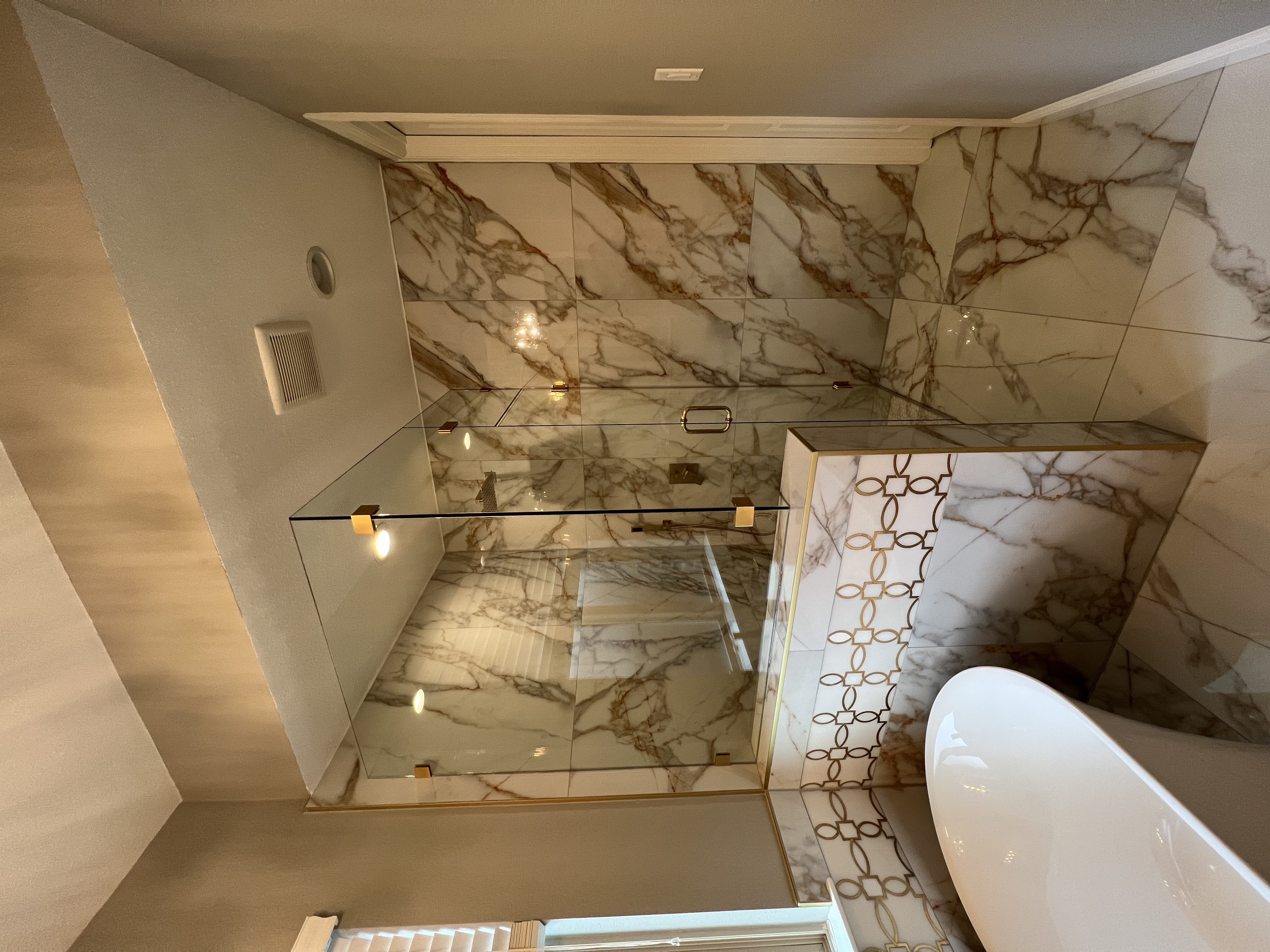 carrollton texas bathroom remodel of marble inlayed shower