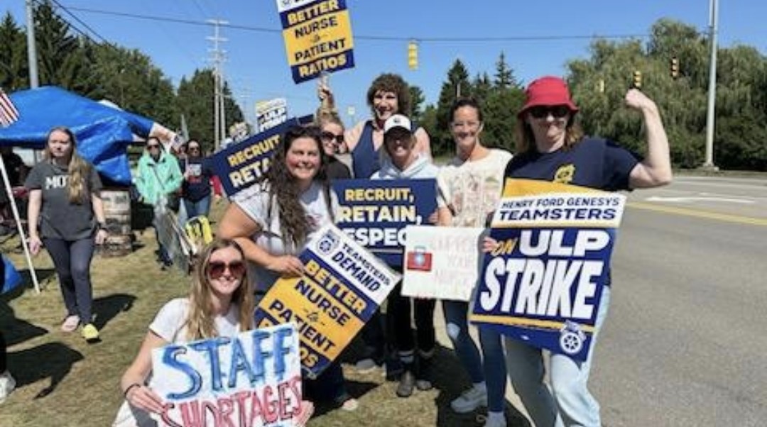 Bill Bain with striking nurses