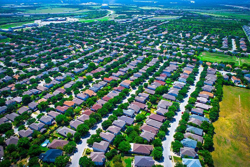 Drone shot overlooking Grapevine residential areas, highlighting properties suited for as-is home sales through Sage Senior Support. Drone shot overlooking Grapevine residential areas, highlighting properties suited for as-is home sales through Sage Senior Support.