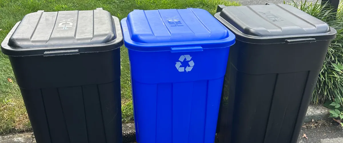 Garbage bin cleaning truck in Northport using hot water sanitation system Garbage bin cleaning truck in Northport using hot water sanitation system